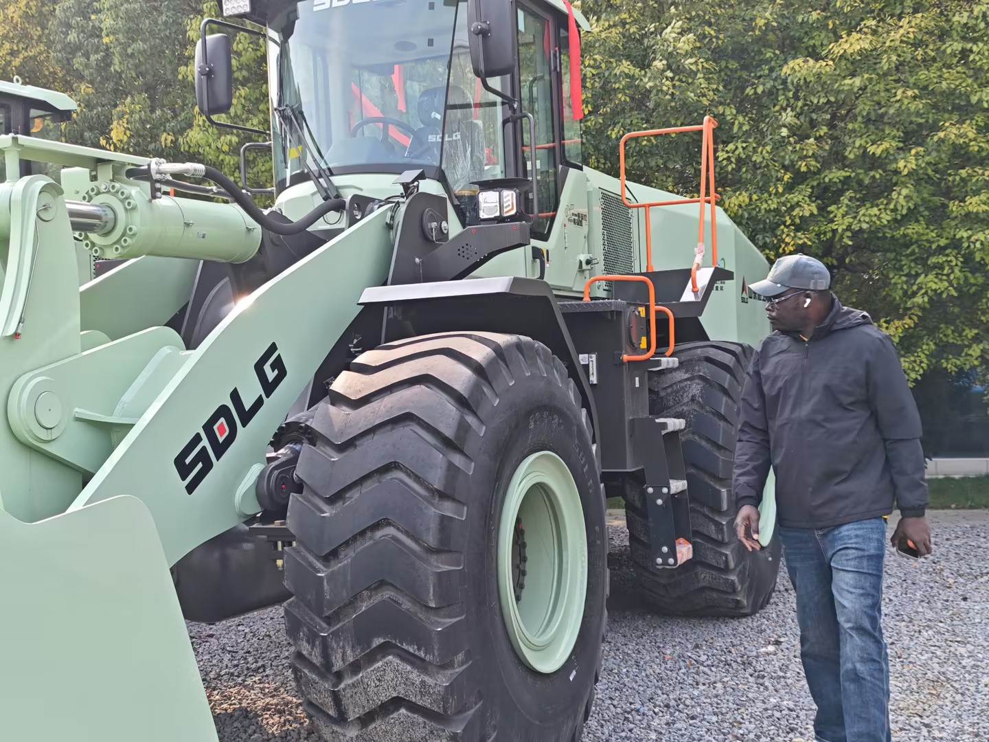 Senegalese client visiting to inspect excavators
