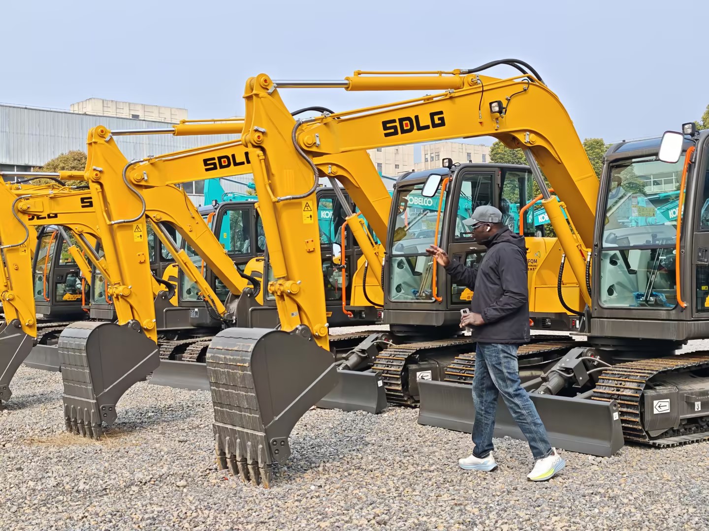 🌍 Senegal Customer Visits Our Factory to Inspect Excavators and Aerial Work Platforms